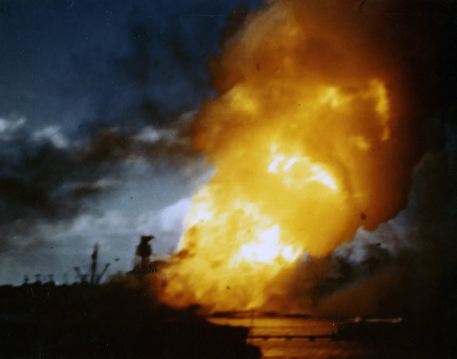 The USS Arizona burning at Pearl Harbor on December 7, 1941