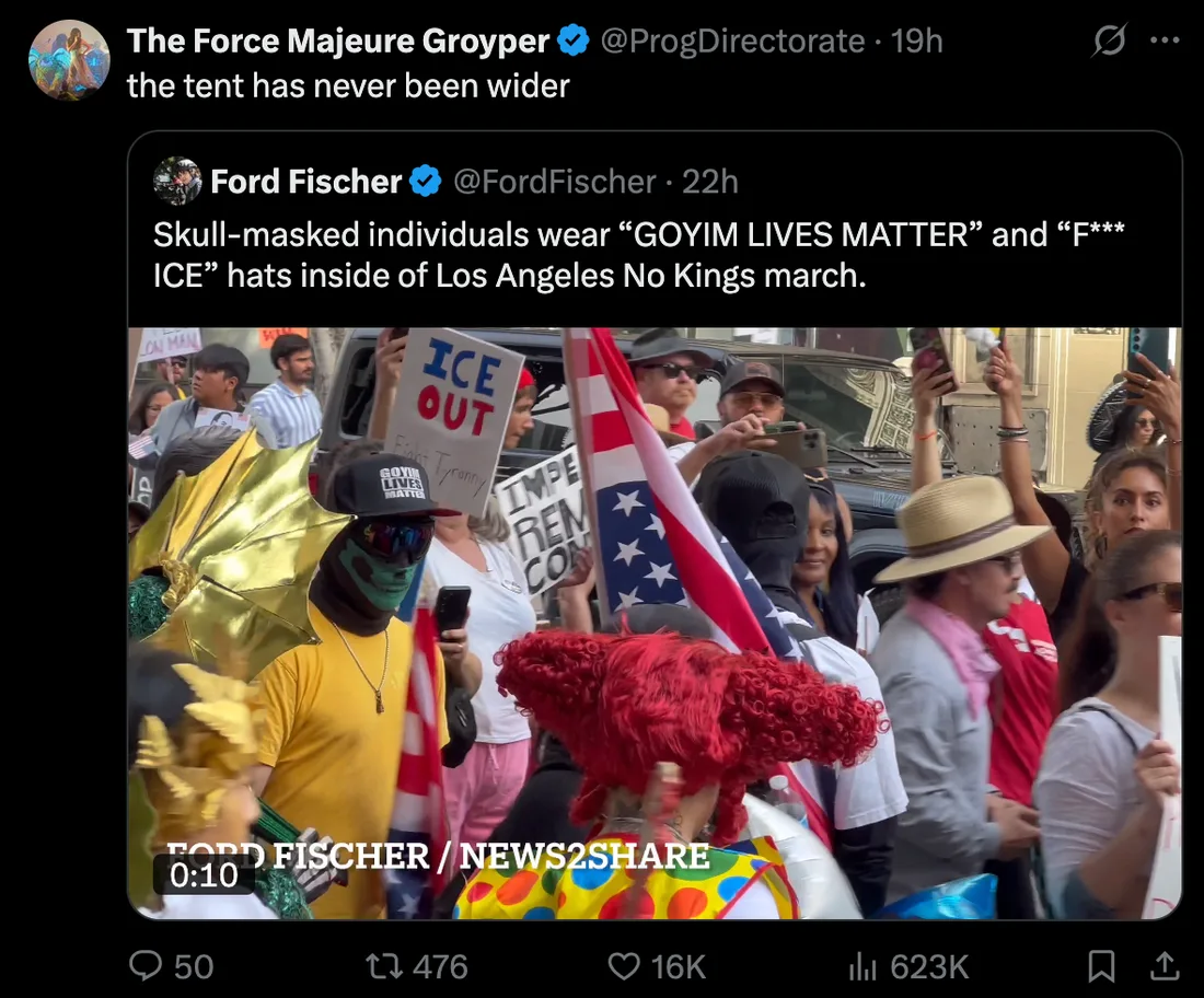 X quote-tweet of protest video: person in skull mask and cap reading GOYIM LIVES MATTER at a street march